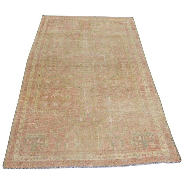 Hand-knotted with care using traditional rug-making techniques, this wool rug blends timeless craftsmanship with a modern...