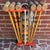 Antique croquet set, painted in traditional colors. This complete set sits organized in a red stand. A fantastic lawn...