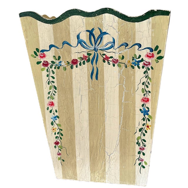 Signed hand-painted wastebasket designed by Jane Keltner for Two's Company, crafted from solid wood with a charming...