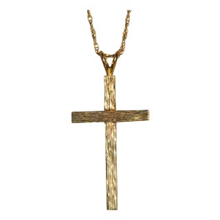 The Santu: 14 Karat Yellow Gold Cross Necklace For Sale