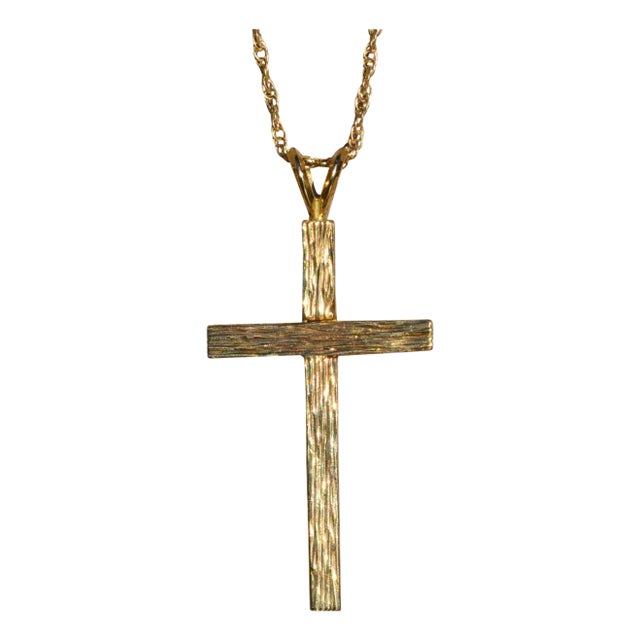 The Santu: 14 Karat Yellow Gold Cross Necklace For Sale