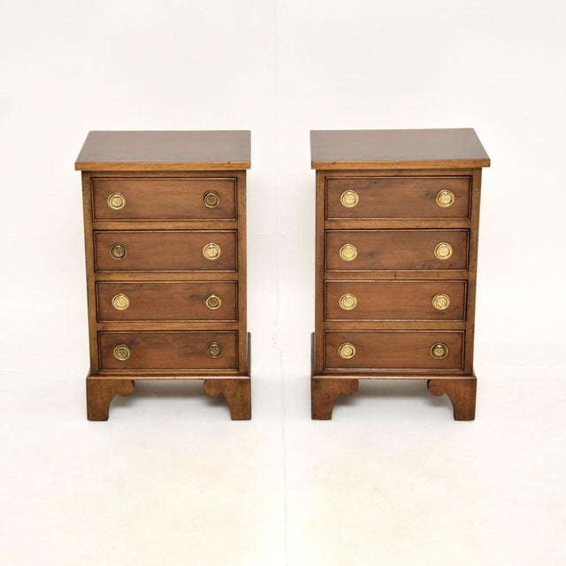 A lovely pair of antique Georgian style yew wood bedside chests. They were made in England, they date from around the...