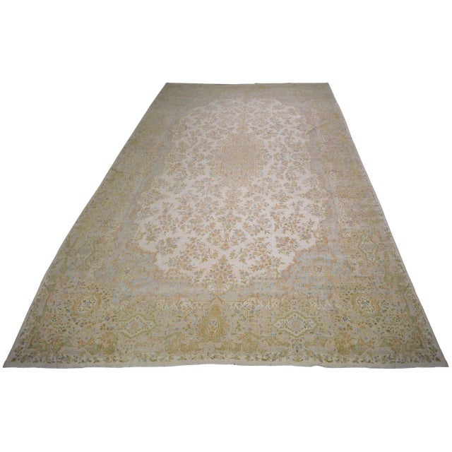 Hand-knotted with care using traditional rug-making techniques, this wool rug blends timeless craftsmanship with a modern...