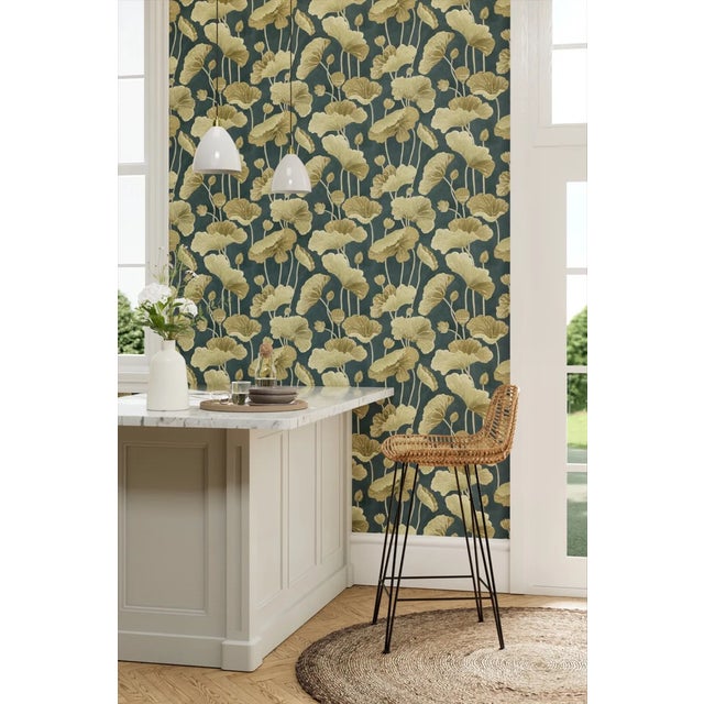 An unusual interpretation of long-stemmed lotus leaves reaching skyward hand drawn by the Sanderson studio. Representing...