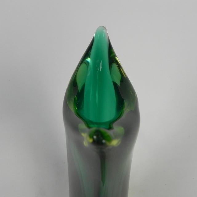 Luxury handmade vase featuring the famous Sommerso glassblowing technique, crafted from original Murano glass. The vase...
