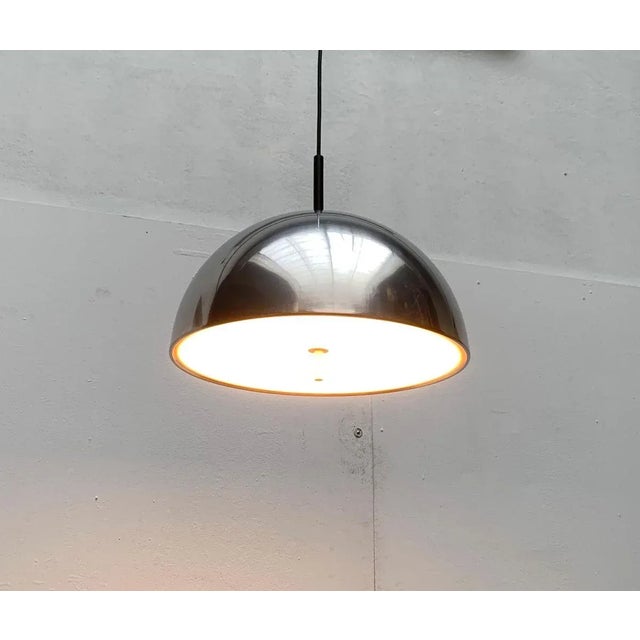 Space Age Dome pendant lamp from the well-known manufacturer Staff Leuchten, Germany. The shade comprises a simple...