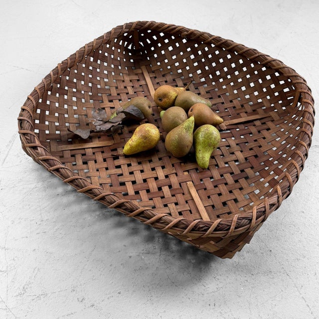Set of two Japanese bamboo baskets, dating from circa 1950–1960, Shōwa period, Japan. The baskets are handwoven from fine...