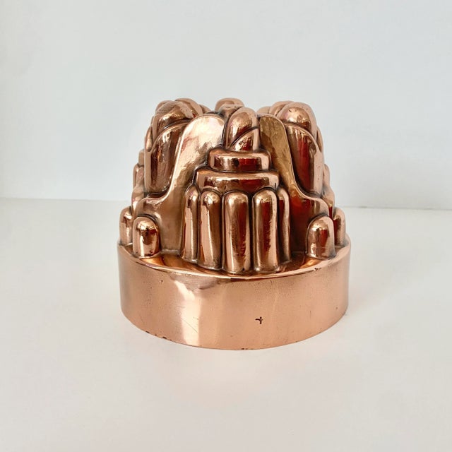 Offered is a fabulous 19th century copper jelly mold made by Benham & Froud of London c1870.. This mold is marked on one...