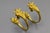 Elegant French Empire–style gilt bronze curtain tiebacks with classical ornament, late 19th century. A refined pair of...