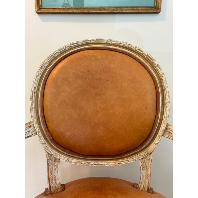 This unique ostrich embossed calf leather chair is in great condition, very comfortable. The chair's base has springs for...