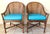 Fabulous pair of McGuire rattan and cane club chairs. Beautiful well-made chairs with leather straps. Aqua blue leather or...