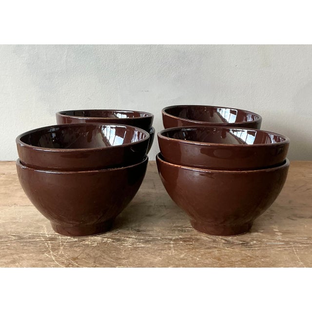 This sophisticated set of eight vintage bowls by the esteemed house of Vietri represents the pinnacle of Italian artisanal...