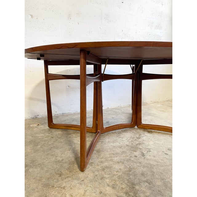Dining or Console table by Peter Hvidt and Orla Molgaard-Nielsen for France & Son Denmark. Drop leaf design. 64w 56d 28h...