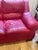 Red leather Italian Natuzzi three seat sofa, soft and comfortable.