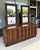 This 1970s Brutalist-inspired dresser, crafted in Canada, features a bold architectural façade with deeply textured ribbed...