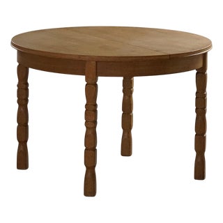 Danish Modern Round Dining Table in Oak with Extension by Henning Kjærnulf, 1960s For Sale