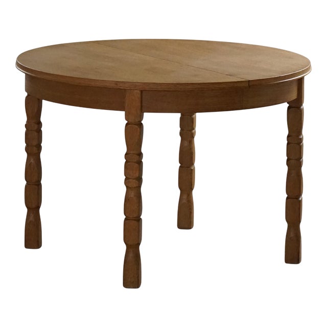 Danish Modern Round Dining Table in Oak with Extension by Henning Kjærnulf, 1960s For Sale