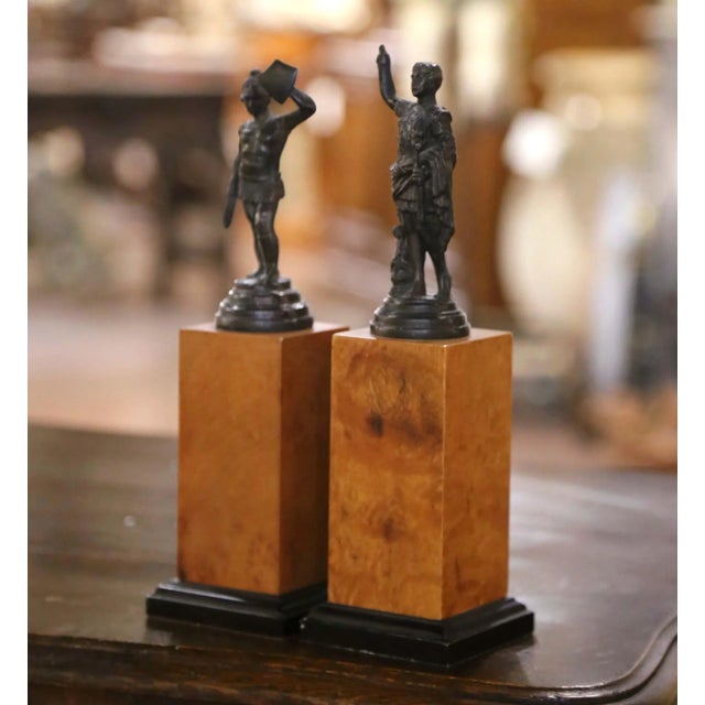 Accessorize an office or library shelving with this pair of small bronze statues mounted on wooden plinths. Each statue...