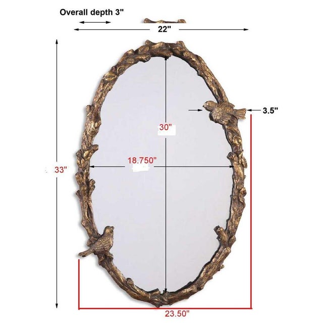 This Oval framed mirror features a bird and vine design. The finish is distressed, antiqued gold leaf with a light gray...