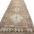 This elegant vintage runner from Kars, Turkey, showcases the bold geometric tradition of Anatolian weaving with a refined...