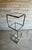 Vintage geometric etagere featuring a chrome frame with inset glass shelves & mirrored bottom. Perfect for styling art,...