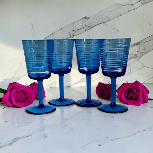 This matching set of four Villeroy & Boch Conga wine goblets, also known as the White Swirl pattern, was produced in...