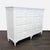 This Stanley Furniture dresser features a clean white finish and unique louvered front design. It has six spacious drawers...