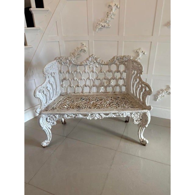 Superb quality antique early Victorian ornate cast iron garden seat having a cast iron shaped back and arms with ornate...