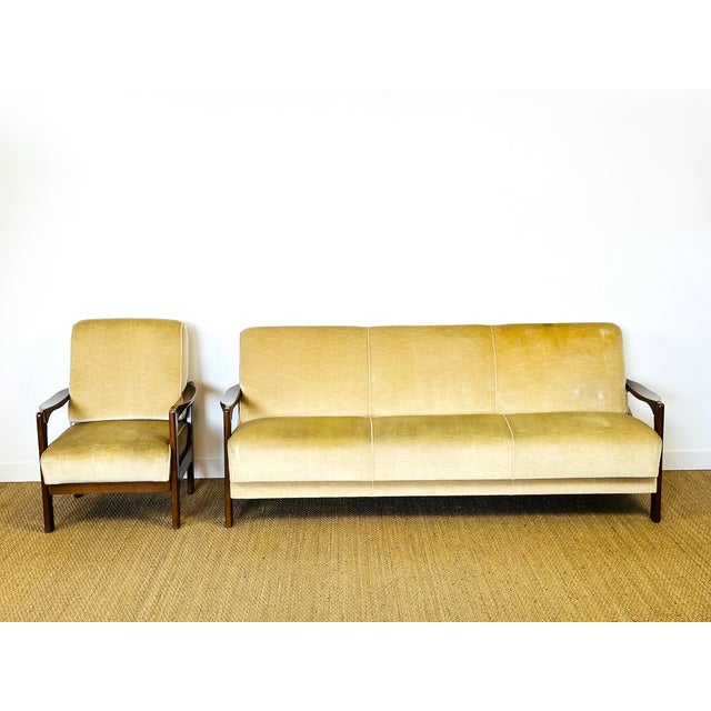 Magnificent living room set comprising a sofa bed and a matching armchair, combining elegance, functionality, and comfort....