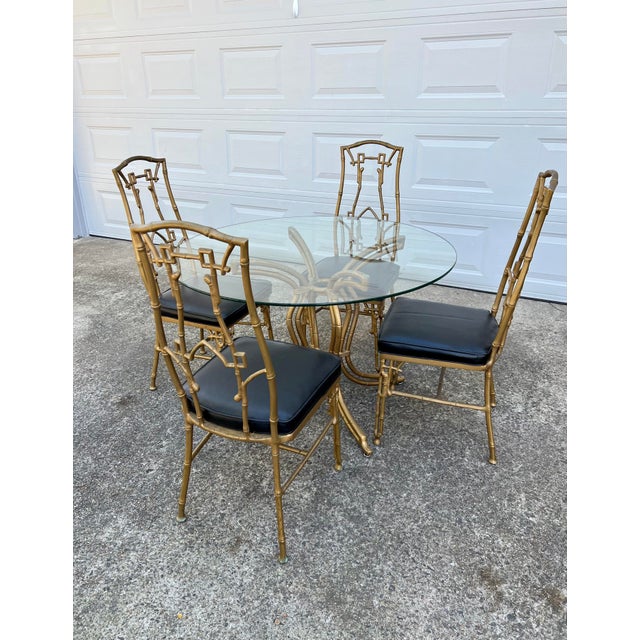 1960s Faux Bamboo SixPiece Cast Iron Glass Top Table and Chairs