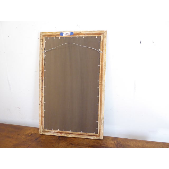 This 19th Century weathered silverleaf mirror is 32.5" x 20.75".