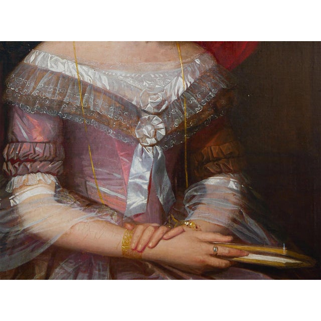 Dark red-toned realist portrait of a Victorian Lady. The painting depicts a middle-aged lady seated against a dark red...