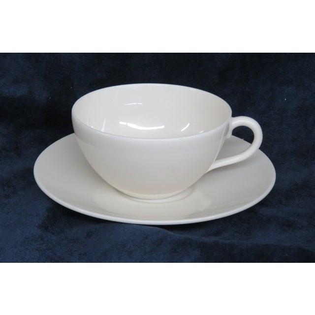 This Cup and Saucers made bone china. These Tea Cup and Saucer were made by Lenox, a fine china/ceramics company, and are...