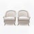 An elegant set of a three-seater sofa and two armchairs, french from the 1950s, featuring a soft, enveloping silhouette...