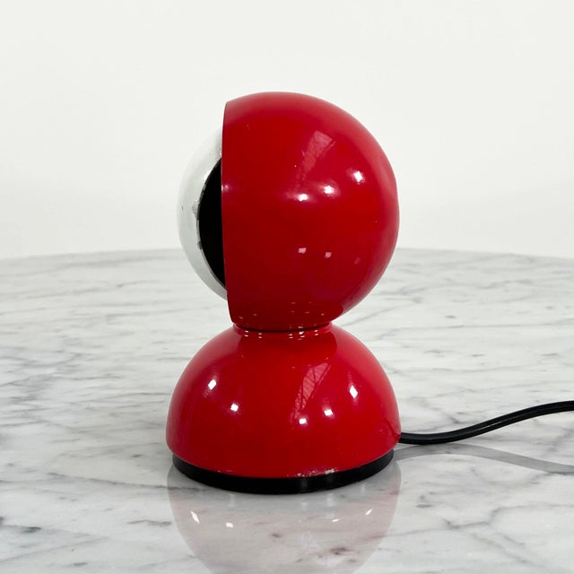 Red Eclisse Table Lamp by Vico Magistretti for Artemide, 1960s, in Worn conditions. Designed 1960 to 1969 This piece has...