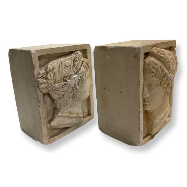 Vintage Italian Pair of Bookends in Plaster with design of Roman Faces . some chips about used and age.