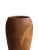 Enhance your decor with this striking teak wood vase, a true testament to natural beauty and craftsmanship. The vase...