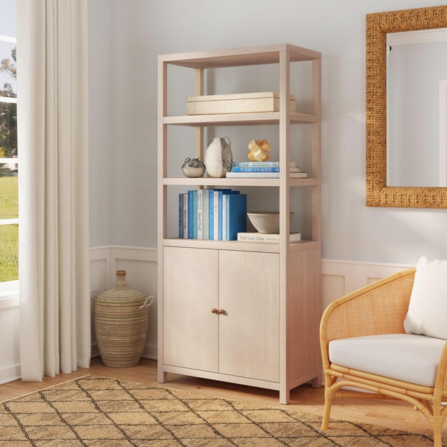 Sleek, refined, and endlessly functional, the Butler Specialty Company Nora Wood Etagere Bookcase with Cabinet is a...