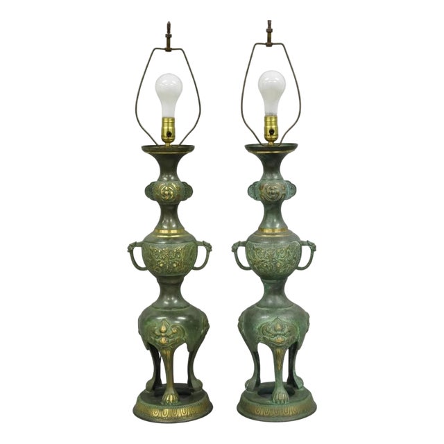 Early 20th Century Chinoiserie James Mont Style Green Bronze Chinese Foo Dog Table Lamps - A Pair For Sale