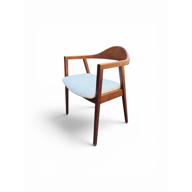 Elevate your space with this striking Mid-Century Modern armchair by the historic Johnson Chair Co. (Chicago, IL)....