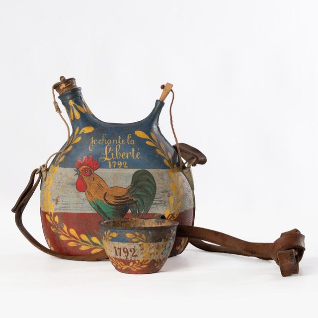 Antique WW1 French canteen water bottle with possibly post war patriotic French Revolution Paint Decoration. Leather...