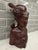 An extraordinary, highly sophisticated mid-century Balinese portrait bust depicting a young nobleman or prince. Standing...