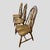 A charming and well-proportioned set of three Colonial Revival Windsor chairs dating to the turn of the 20th century. Each...