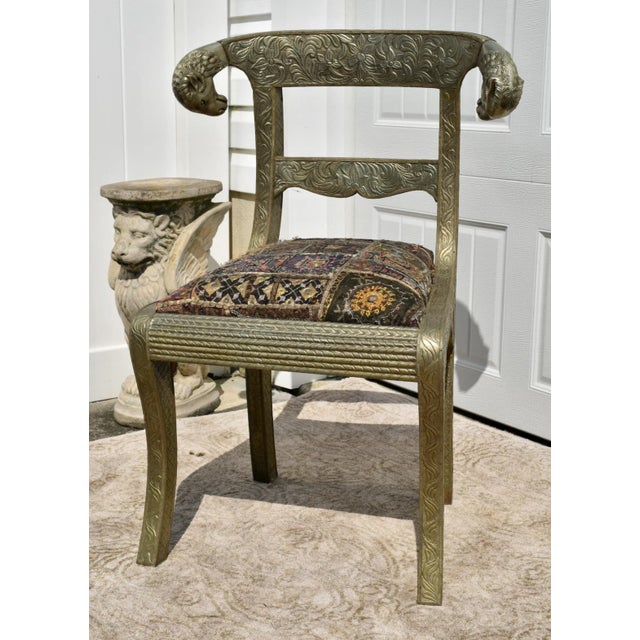 Vintage (1940s) Unique Chair has an Regency Anglo Indian Style. Wood Frame with a Hand Hammered Pewter Finish. Rams Head...