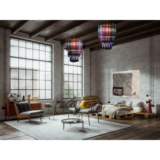 Pair fantastic murano chandeliers each made by 187 murano crystal multicolored prism in a nickel metal frame. The glasses...