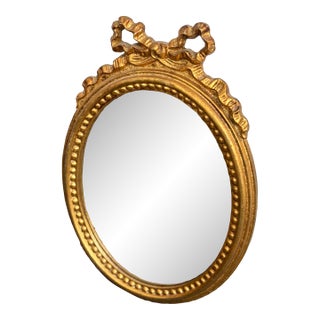 Italian Gold Gilt Carved Mirror With Bow For Sale