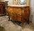 Make a statement with this magnificent French commode, showcasing exceptional floral marquetry, graceful serpentine lines,...