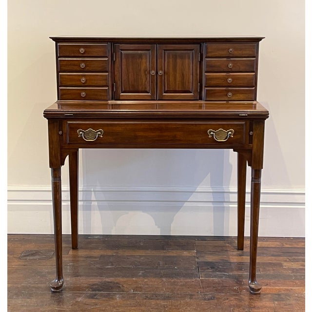 Crafted from solid cherry, this ladies writing/secretary desk by Pennsylvania House features graceful tapered back legs...