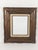 A beautifully detailed vintage carved wood picture frame featuring a substantial, sculptural profile and a rich,...