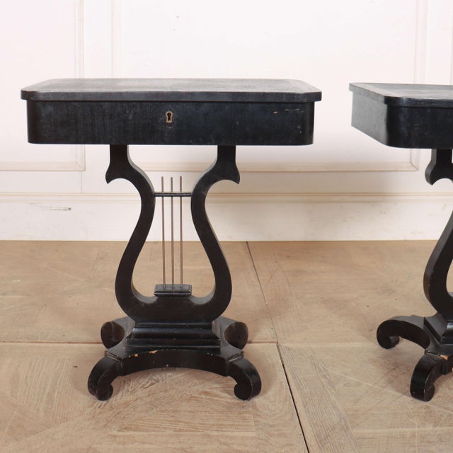 Interesting pair of Lyre based beech lamp tables/ bedside tables with lift up lid. 1920 This piece is designed in the...